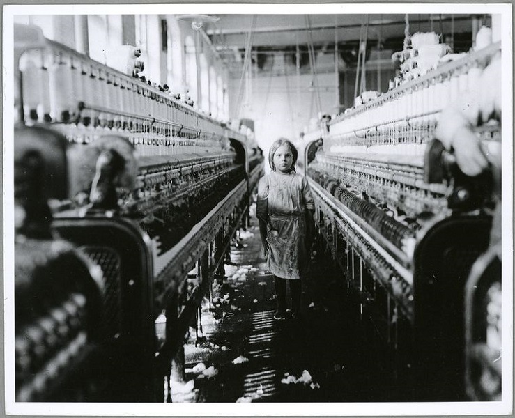 Elsewhere, children working in cotton mills, like this one in North Carolina, were often orphans. The mills employed these children in exchange for shelter, food, and water.